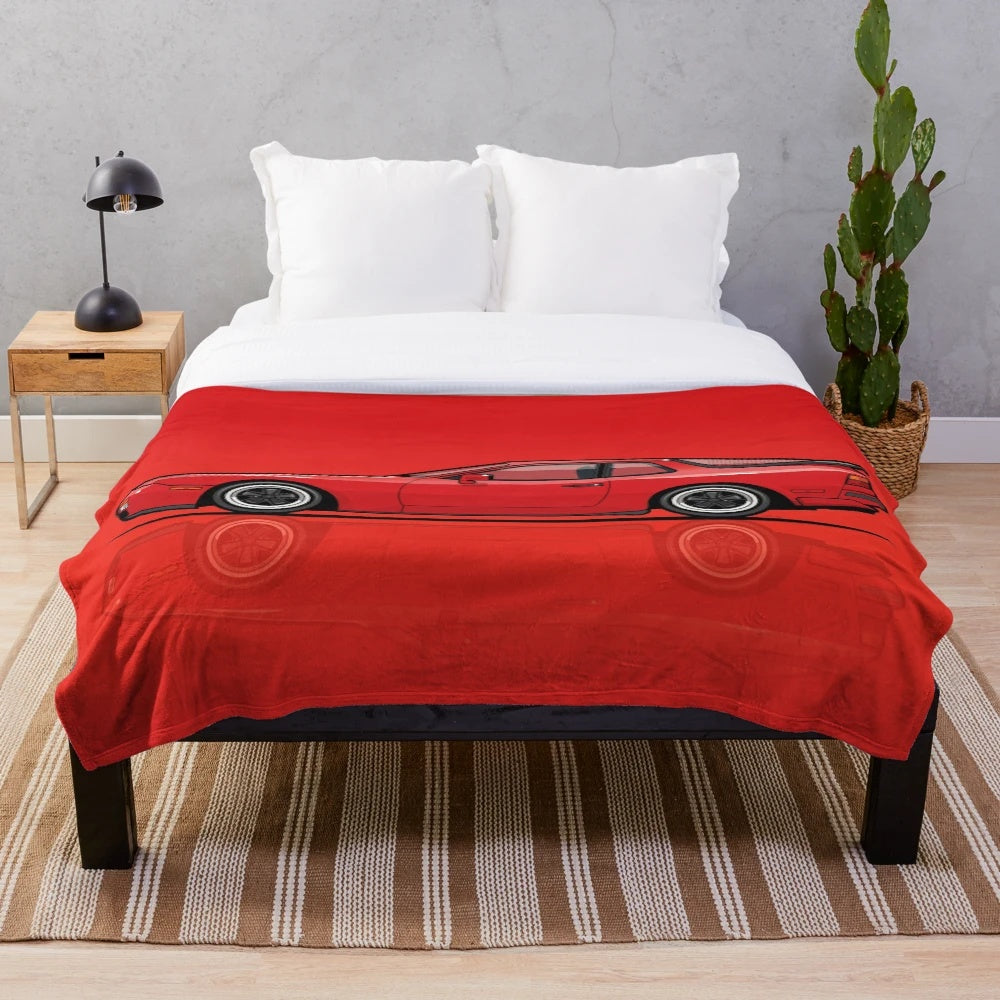 Plush blanket featuring a vintage Porsche 944 Turbo in red