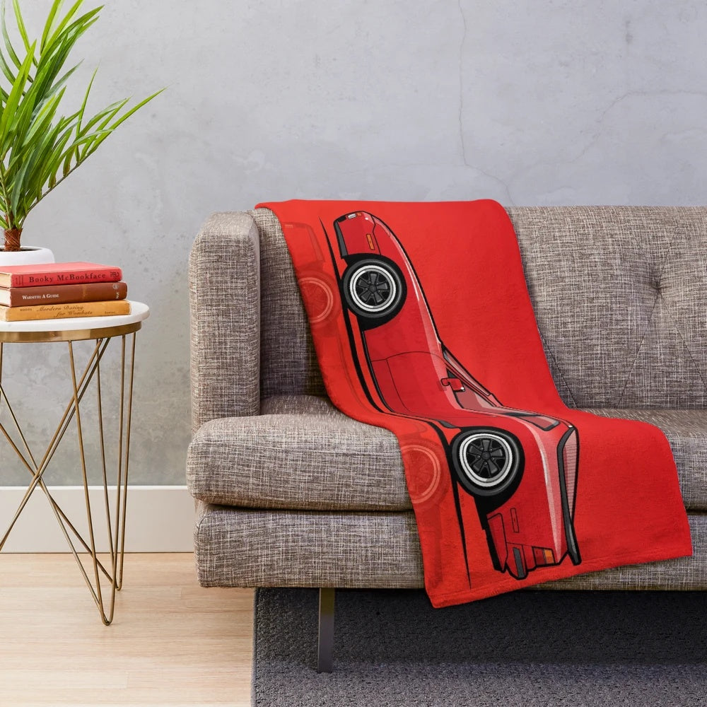 Plush blanket featuring a vintage Porsche 944 Turbo in red