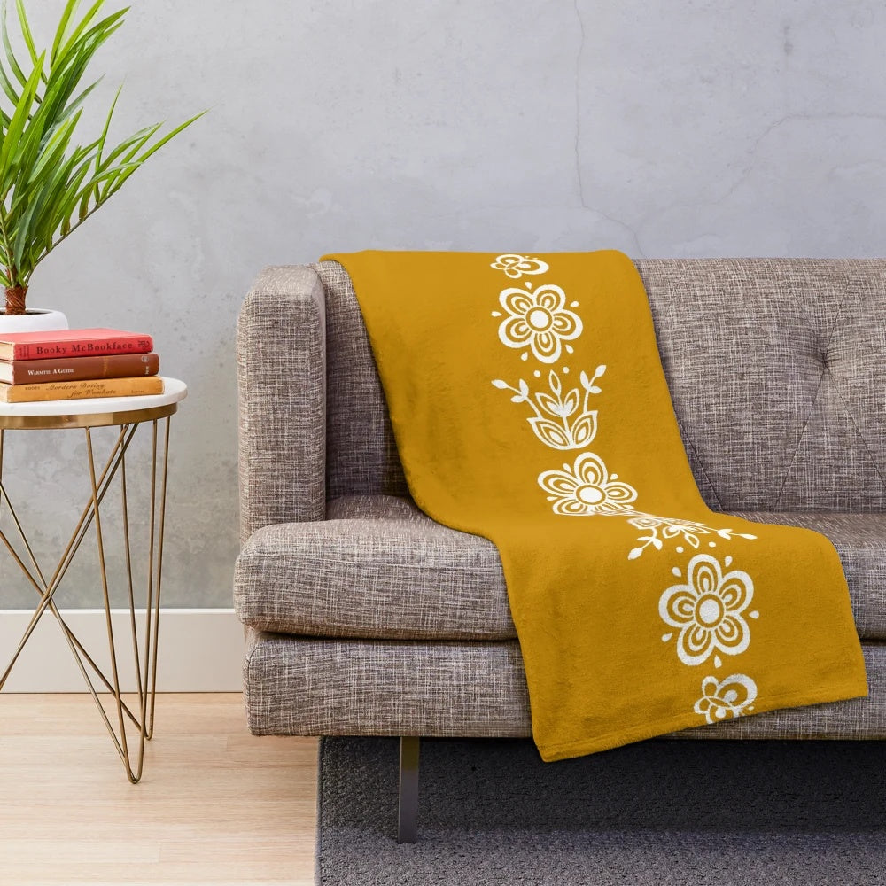 Vintage-inspired plush blanket featuring Pyrex Butterfly Gold design