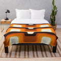 Vibrant orange retro plush blanket with midcentury modern inspired design