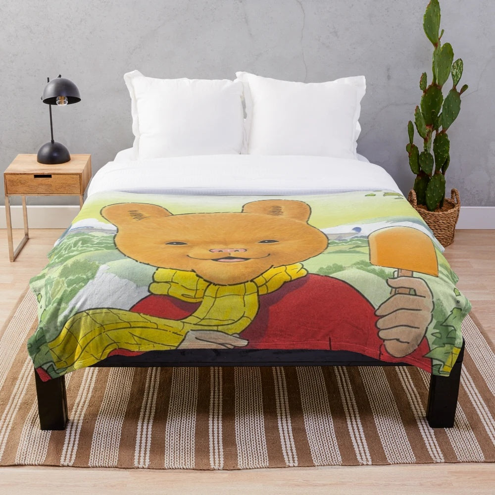 Vintage-style Rupert Bear plush blanket with classic cartoon design