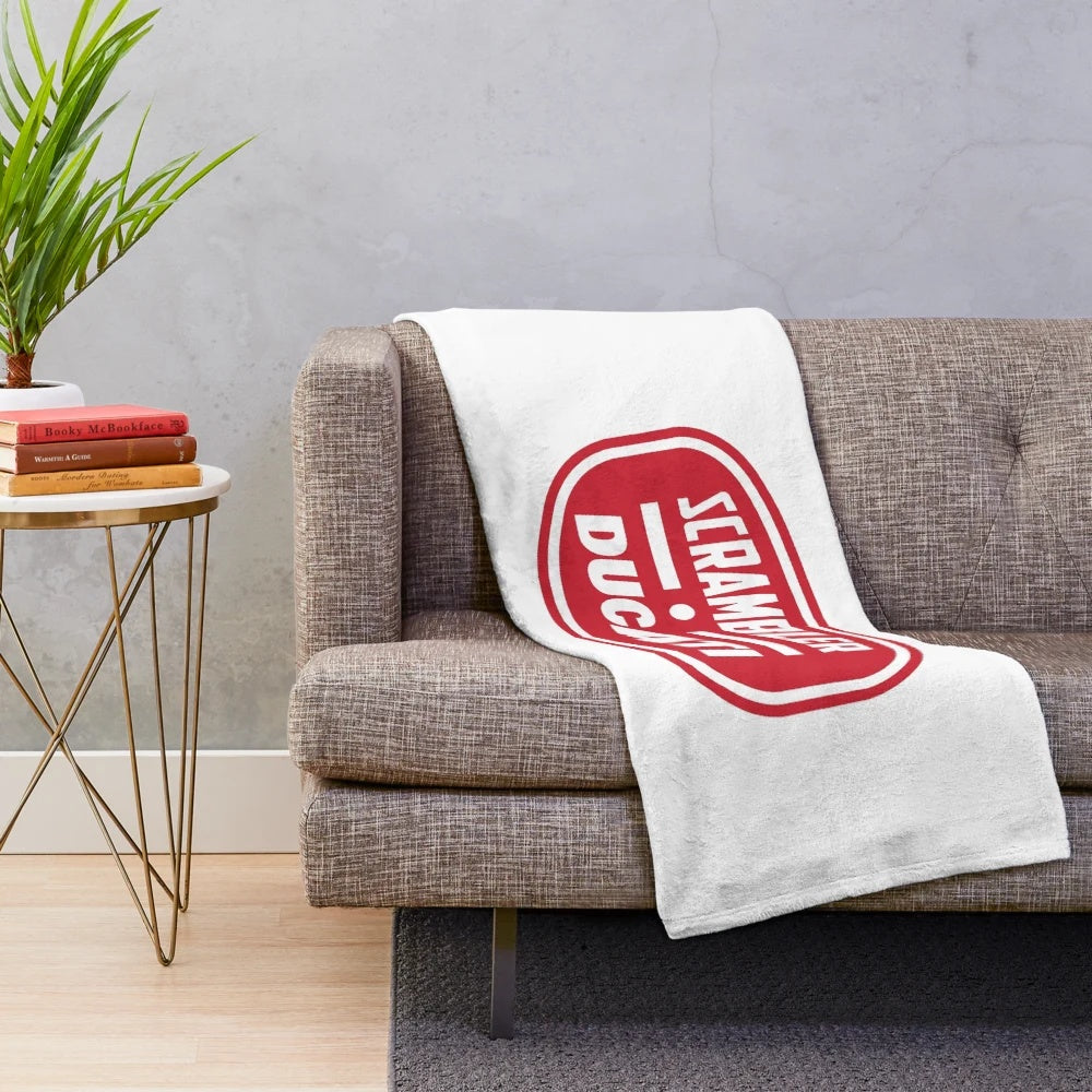 Cozy plush blanket featuring the iconic Scrambler Ducati motorcycle logo