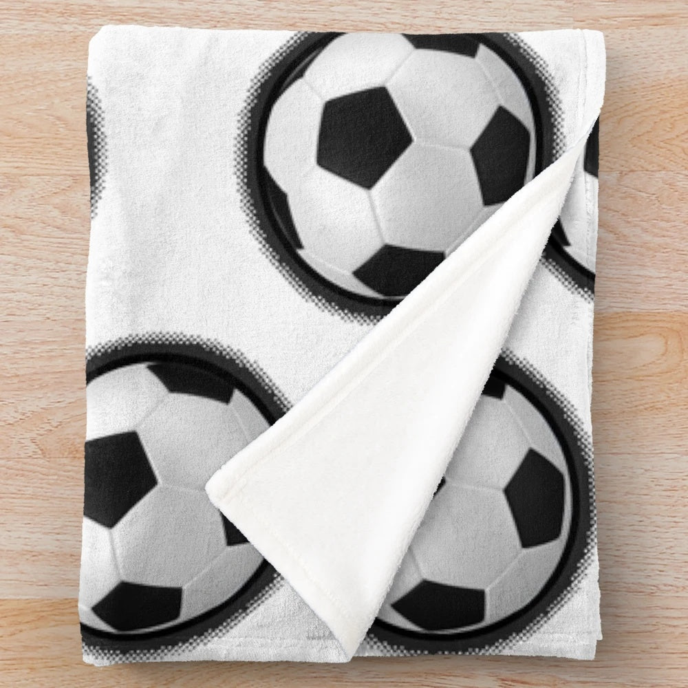 Soft and cozy soccer-themed plush blanket with a vintage halftone design