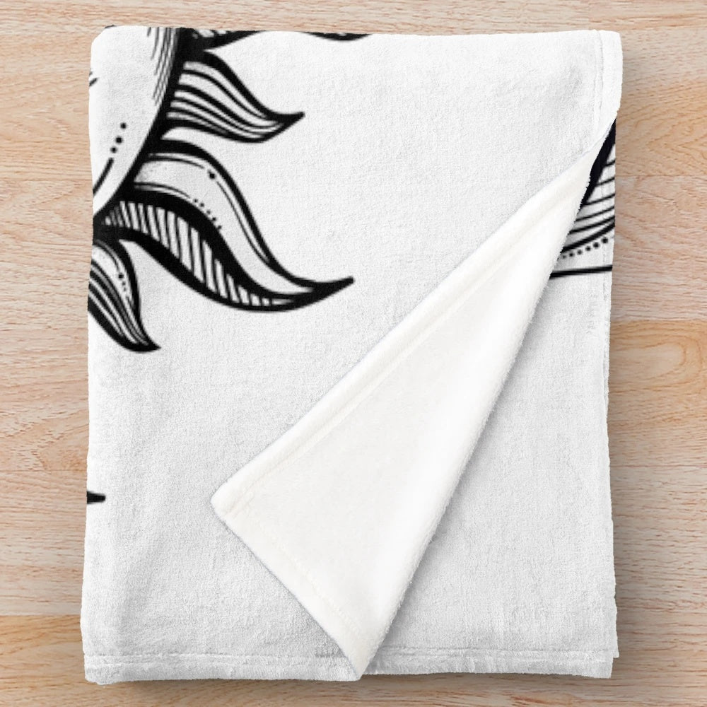 Vintage-inspired plush blanket with a design featuring a solar eclipse, sun, and moon