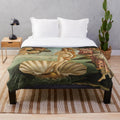 Sandro Botticelli-inspired plush blanket featuring the Greek goddess Venus emerging from the sea