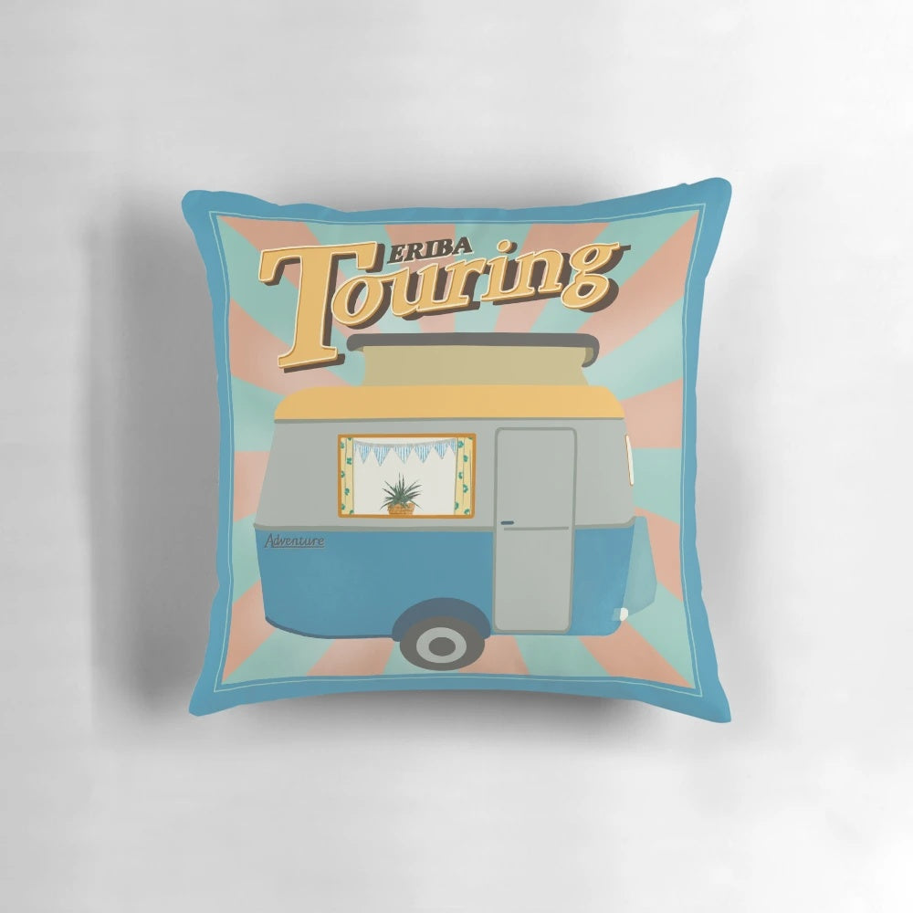 Vintage-inspired throw pillow featuring a retro touring caravan design