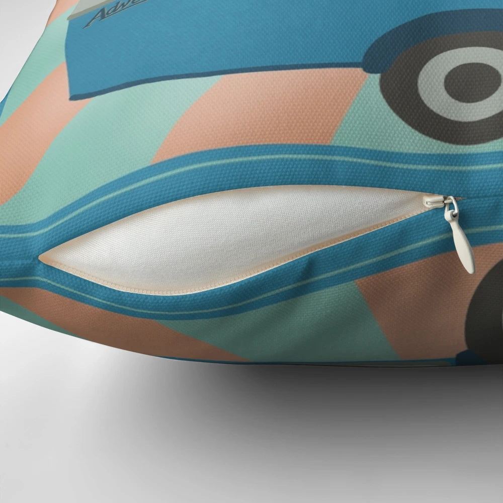 Vintage-inspired throw pillow featuring a retro touring caravan design