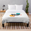 Vintage-inspired travel plush blanket with retro European landscape and airplane design
