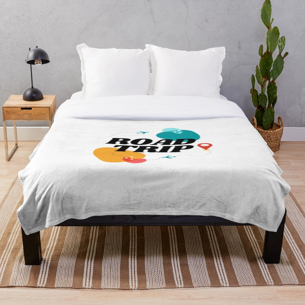 Vintage-inspired travel plush blanket with retro European landscape and airplane design