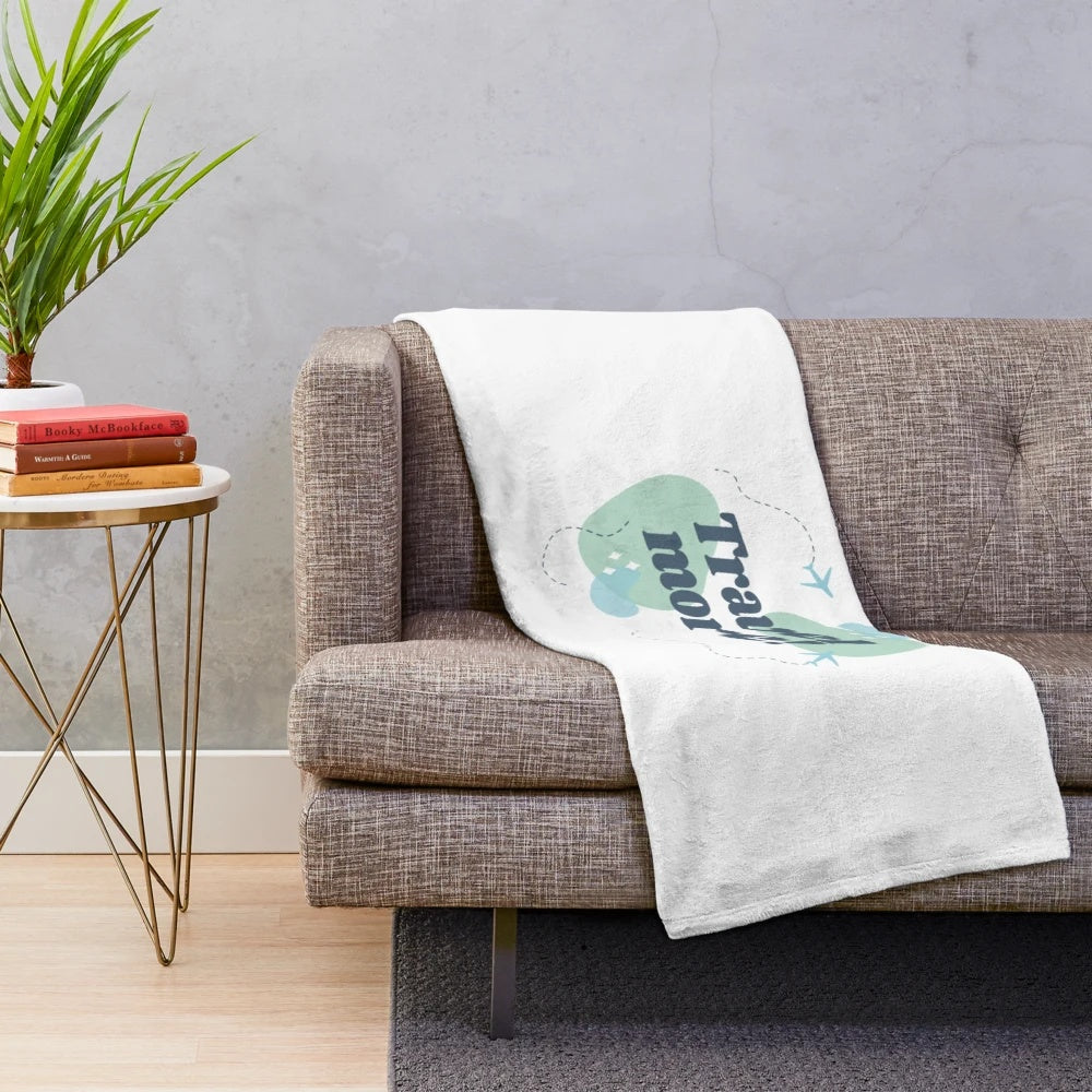 Vintage-inspired travel themed plush blanket with airplane and retro design
