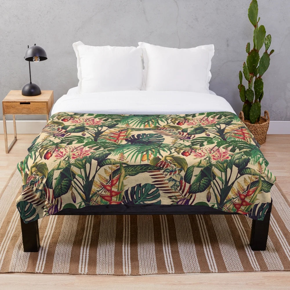 Vintage-inspired tropical floral plush blanket with jungle leaves and flowers