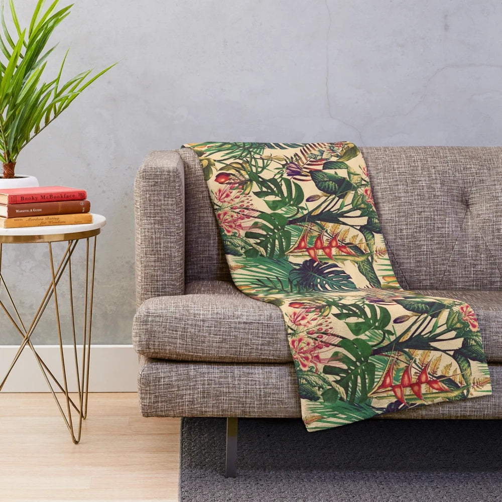 Vintage-inspired tropical floral plush blanket with jungle leaves and flowers