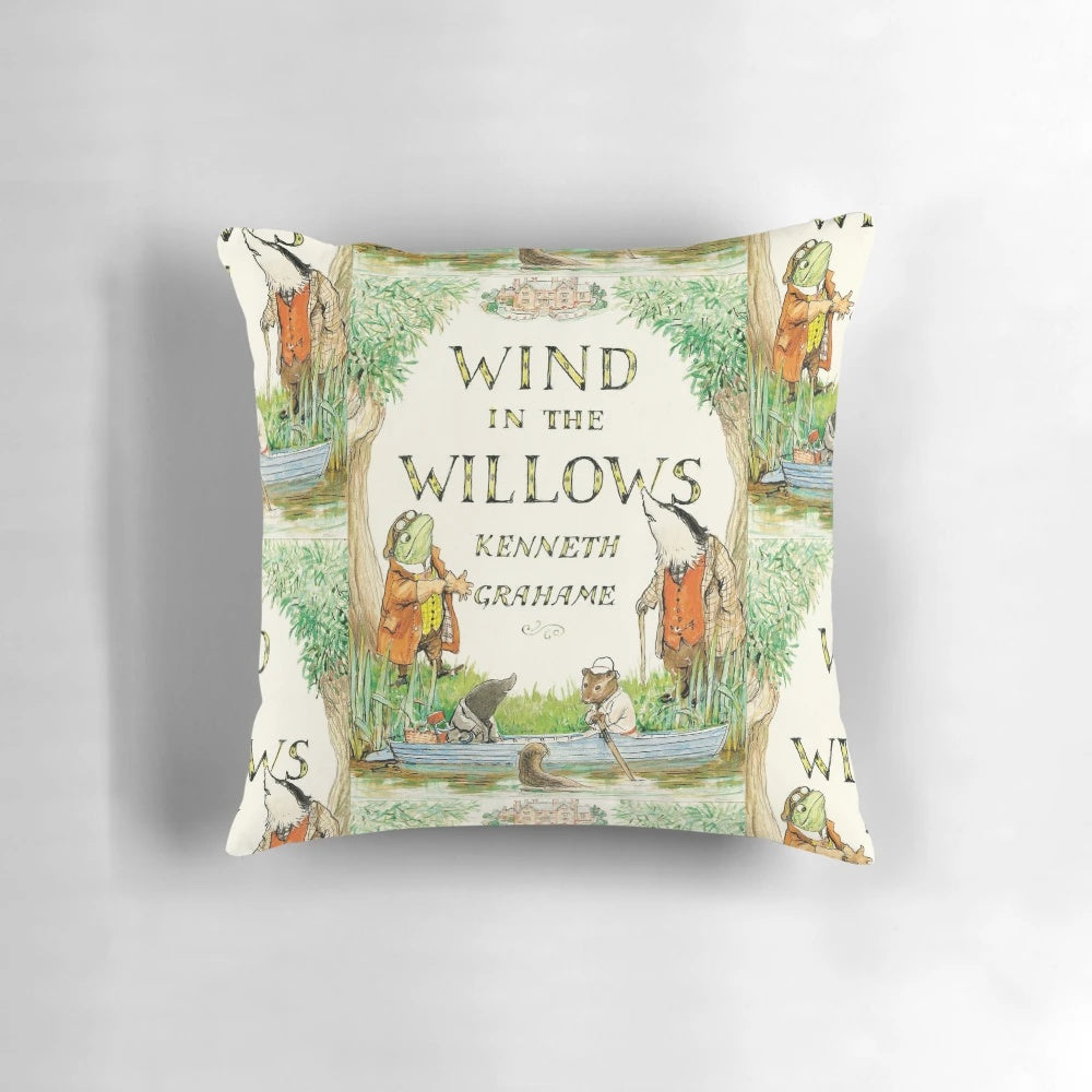 Vintage-inspired decorative pillow featuring the classic book cover of "The Wind in the Willows" by Kenneth Grahame