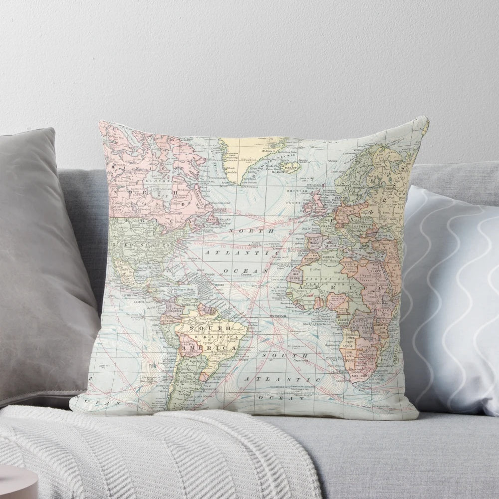 Decorative vintage-style world map printed on a cozy pillow