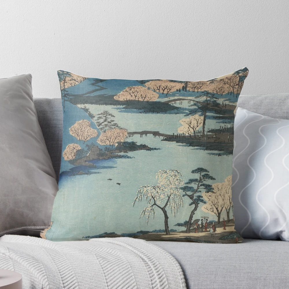 Vintage Japanese river landscape art printed on a soft, plush pillow