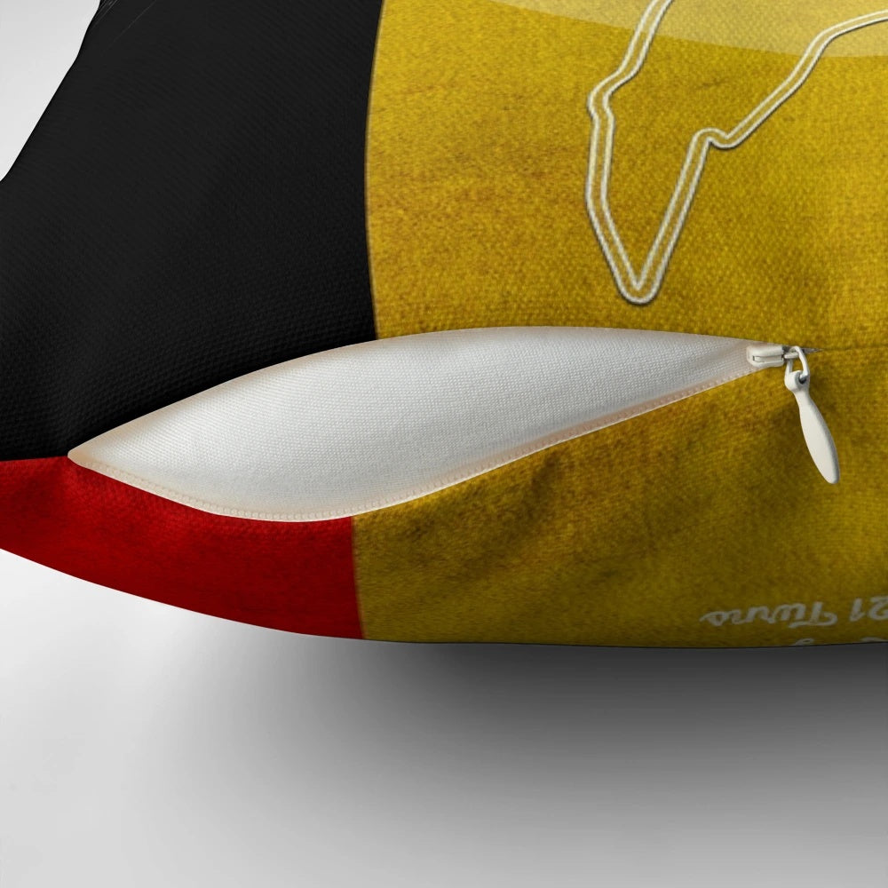Vintage-style landscape printed pillow with racing elements like racetrack, race cars, and motorsports imagery.
