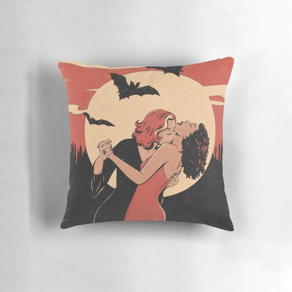 Vintage-inspired pillow featuring a lesbian vampire couple in a romantic embrace, capturing the essence of queer love and the vintage aesthetic.
