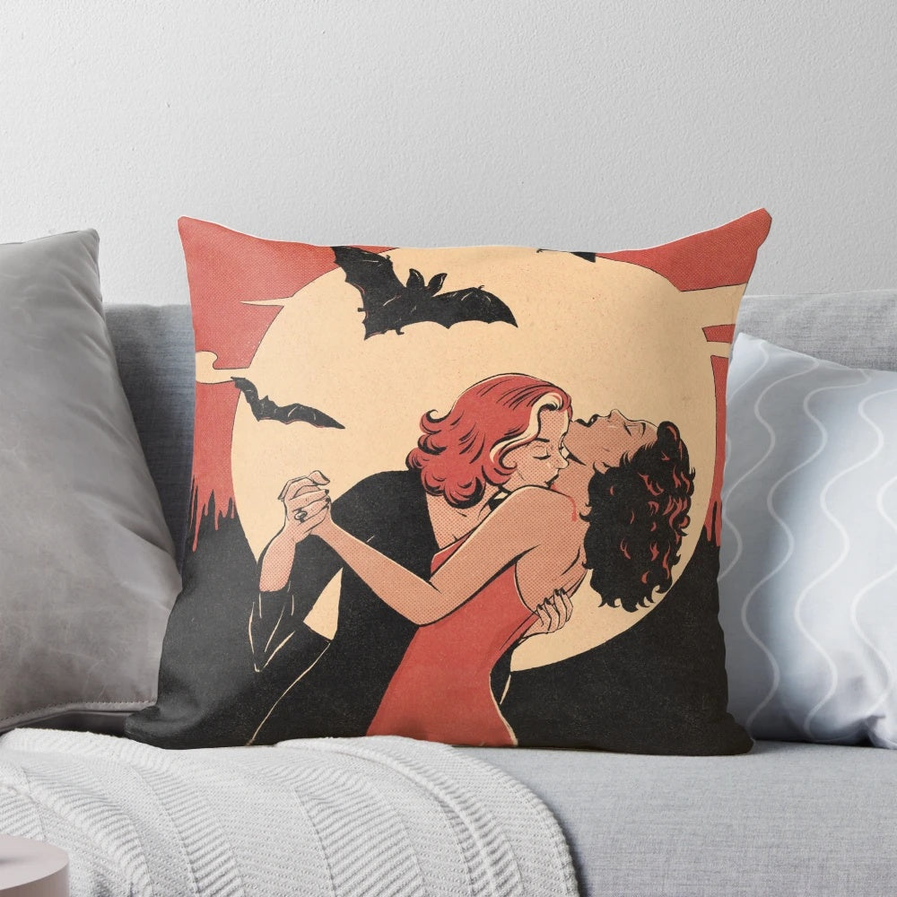 Vintage-inspired pillow featuring a lesbian vampire couple in a romantic embrace, capturing the essence of queer love and the vintage aesthetic.