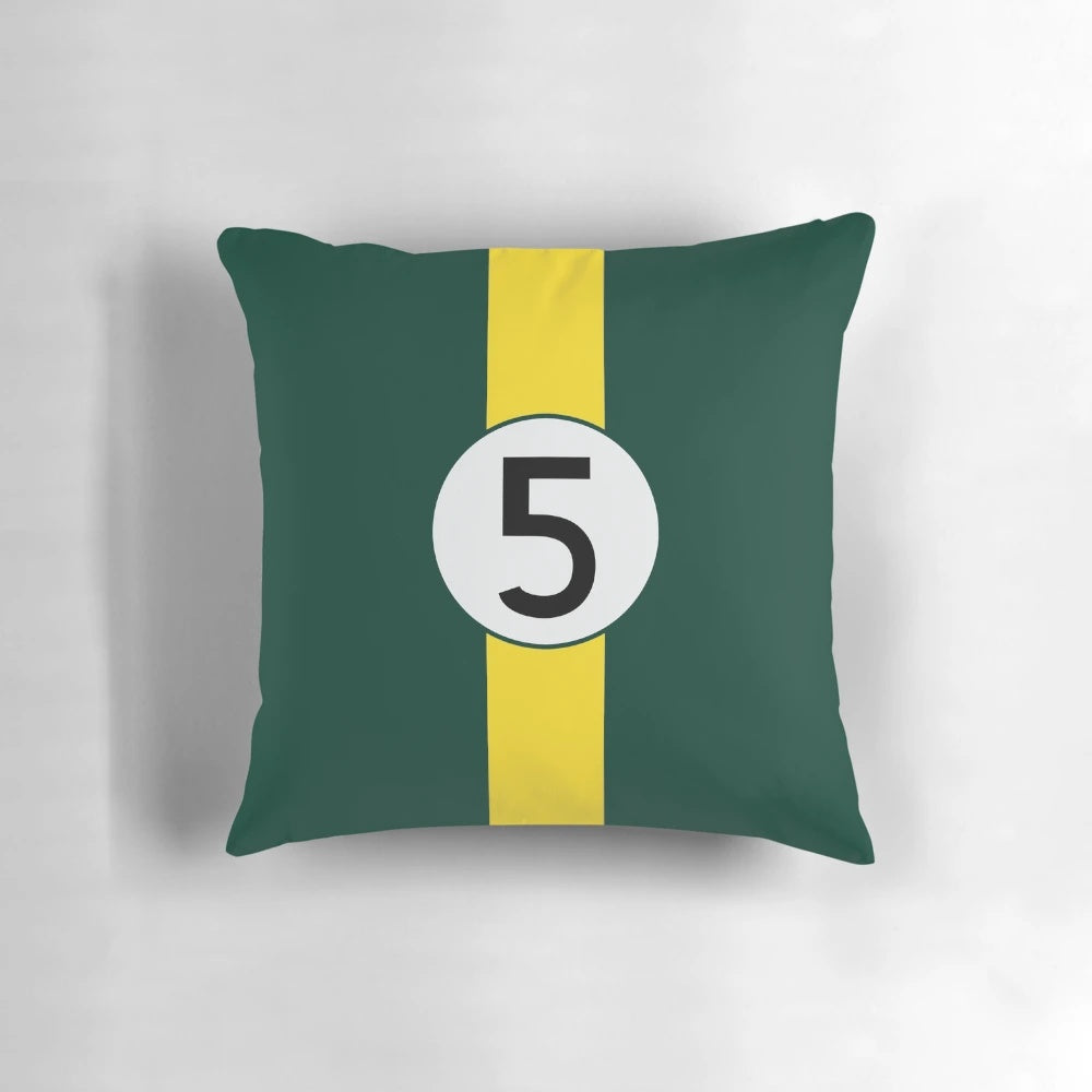 Pillow featuring the vintage green and yellow livery of the iconic Lotus 49 Formula One racing car driven by champion Jim Clark.