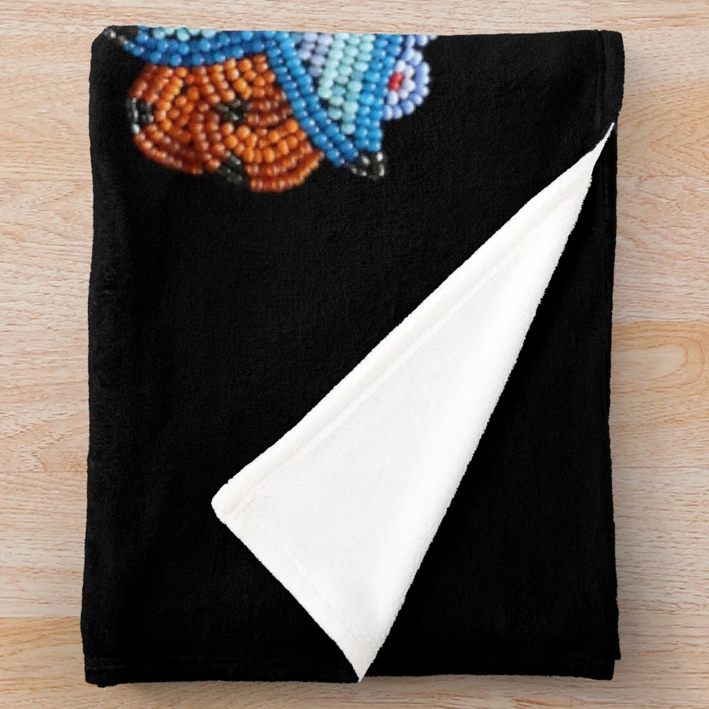 Vintage-style plush blanket with traditional Metis beadwork design