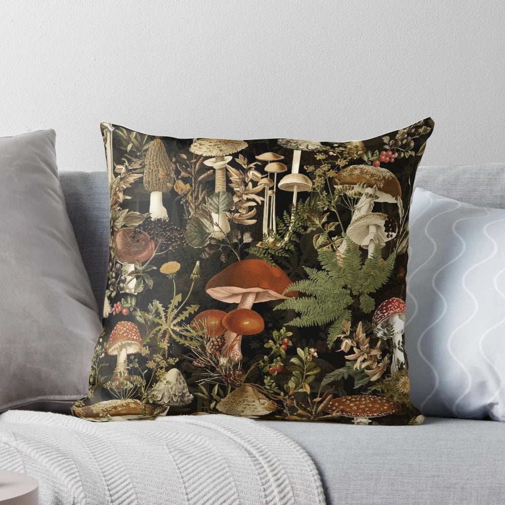 Vintage-style pillow with a dark, moody botanical pattern featuring mushrooms and a night garden scene