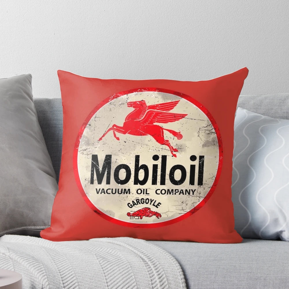 Vintage Mobiloil Gargoyle logo on a cozy throw pillow