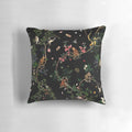 Vintage-inspired monkey pillow with tropical botanical illustrations