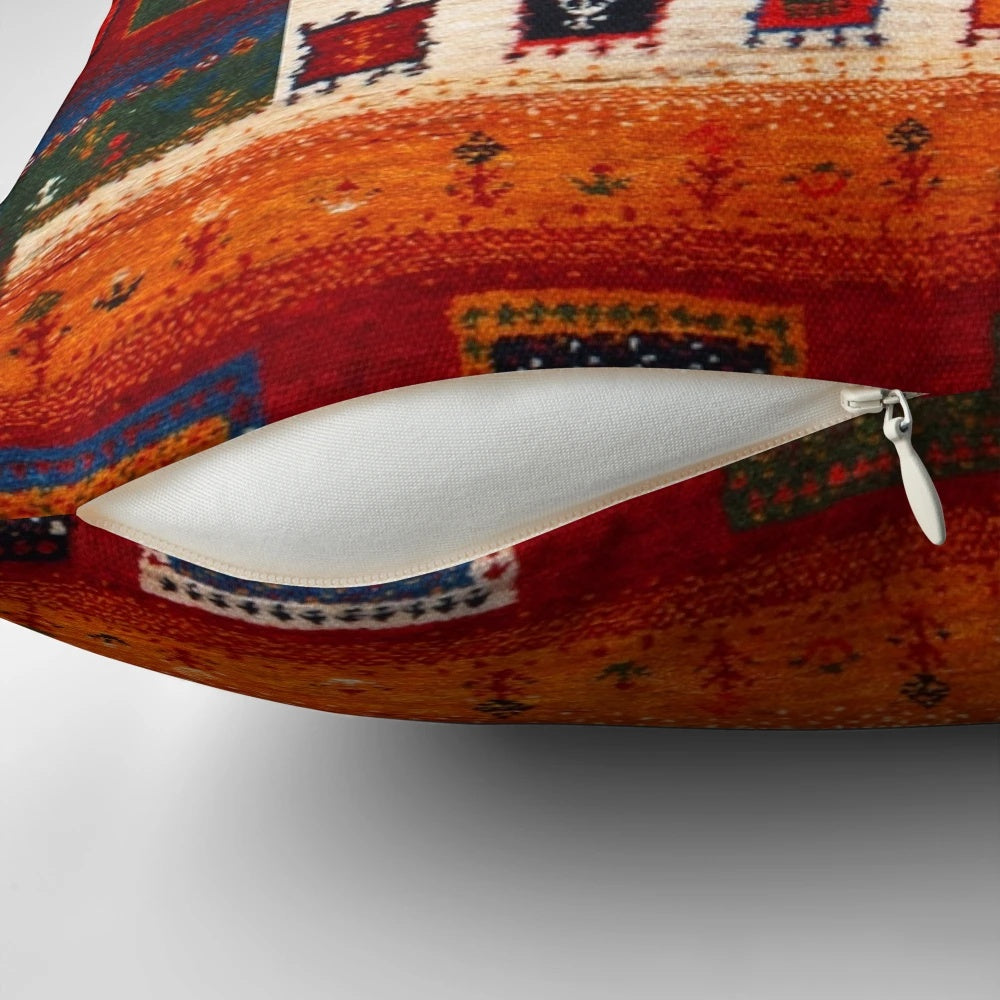 Vibrant, Bohemian-inspired Moroccan-style pillow in autumn colors and vintage fabric patterns.