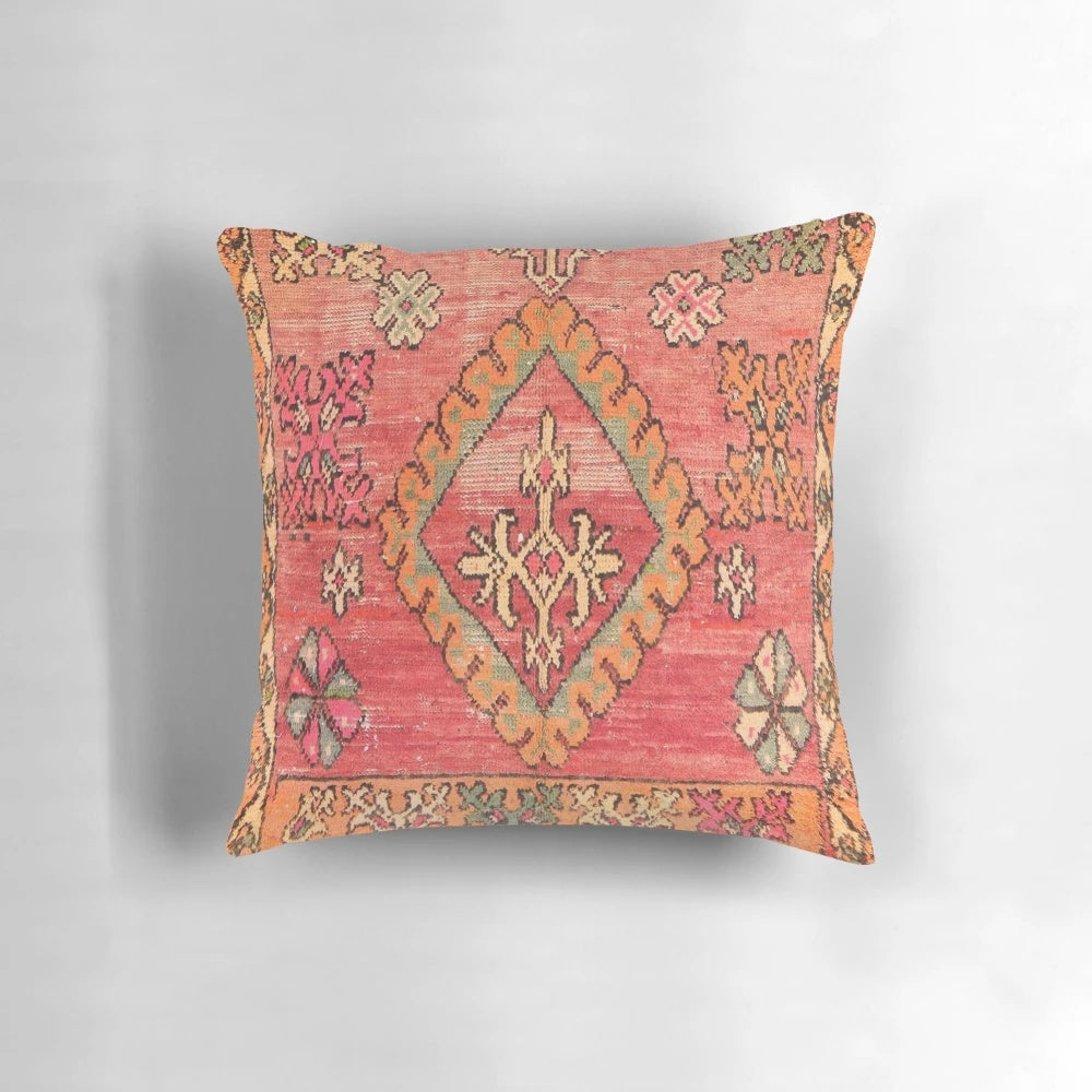 Vintage Moroccan-inspired pillow with abstract graphic design and traditional patterns