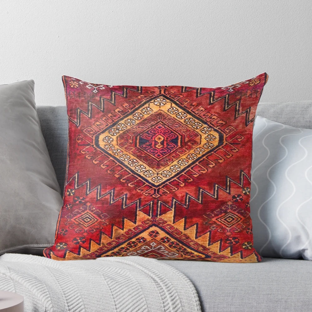Vintage Moroccan style pillow with intricate damask pattern and earthy tones