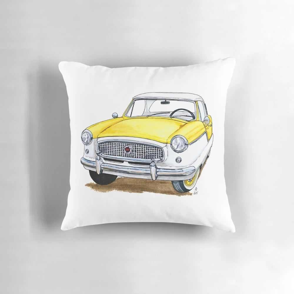 Vintage Nash Metropolitan yellow throw pillow with classic 1950s car design