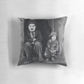 Vintage pillow featuring Charlie Chaplin and Jackie Coogan in the classic silent film "The Kid