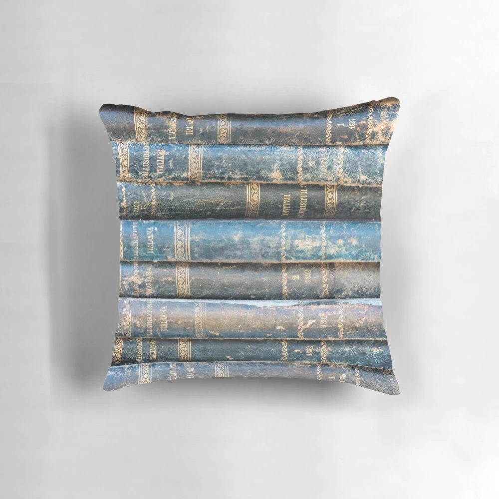 Vintage old books pillow with a rustic antique book spine design in shades of blue and gold