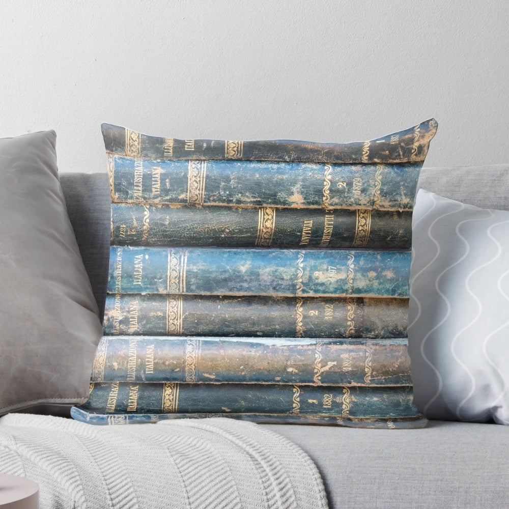 Vintage old books pillow with a rustic antique book spine design in shades of blue and gold