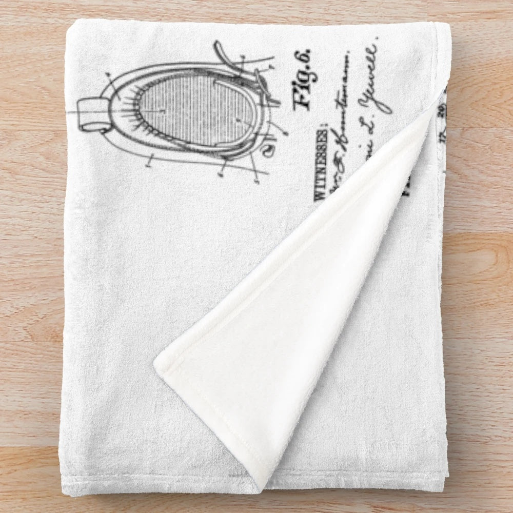 Vintage patent art design featuring a cross country skier on a plush blanket