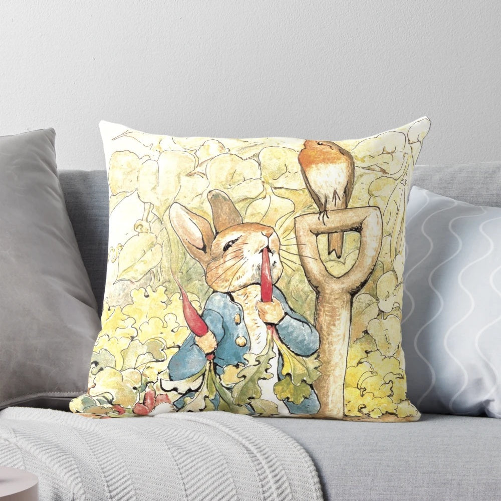 Vintage-style Peter Rabbit pillow with garden elements, designed by Beatrix Potter.