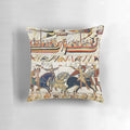 Vintage-style pillow depicting scenes from the Bayeux Tapestry, including medieval knights on horseback, archers, and Norman ships.