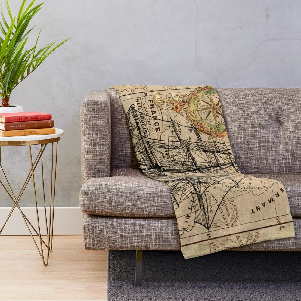 Vintage pirate ship plush blanket with antique world map design