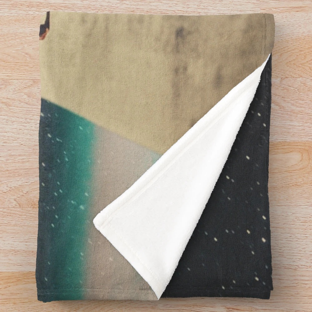 Vintage plush blanket featuring a surreal collage design of a lone wanderer on a cosmic journey