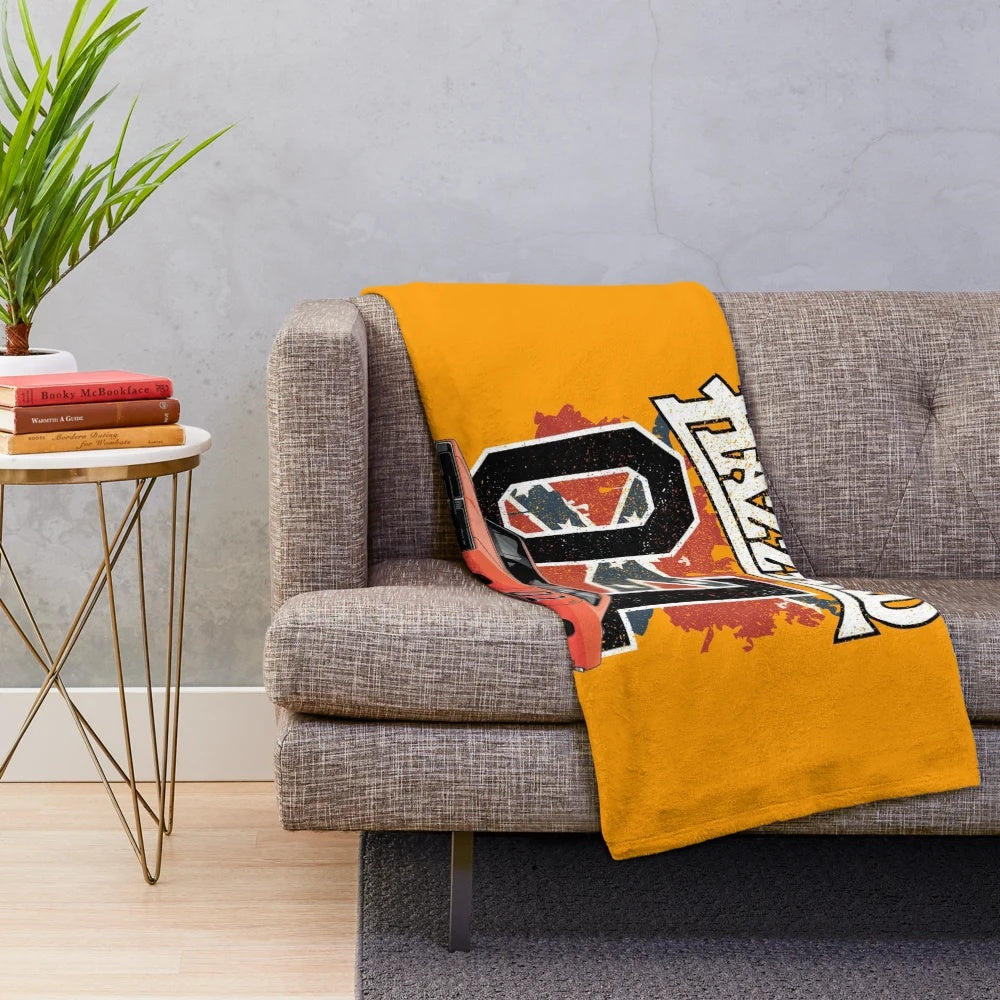 Vintage plush blanket featuring a classic car design inspired by The Dukes