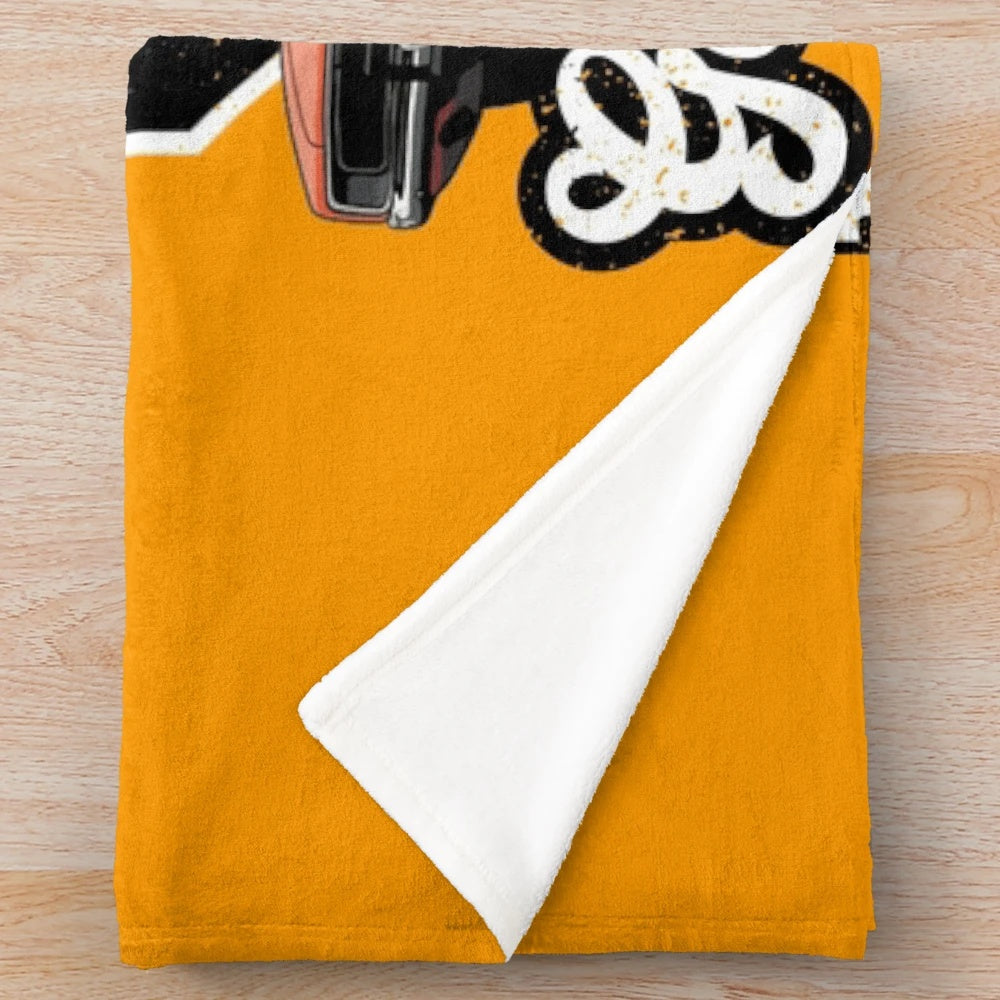 Vintage plush blanket featuring a classic car design inspired by The Dukes