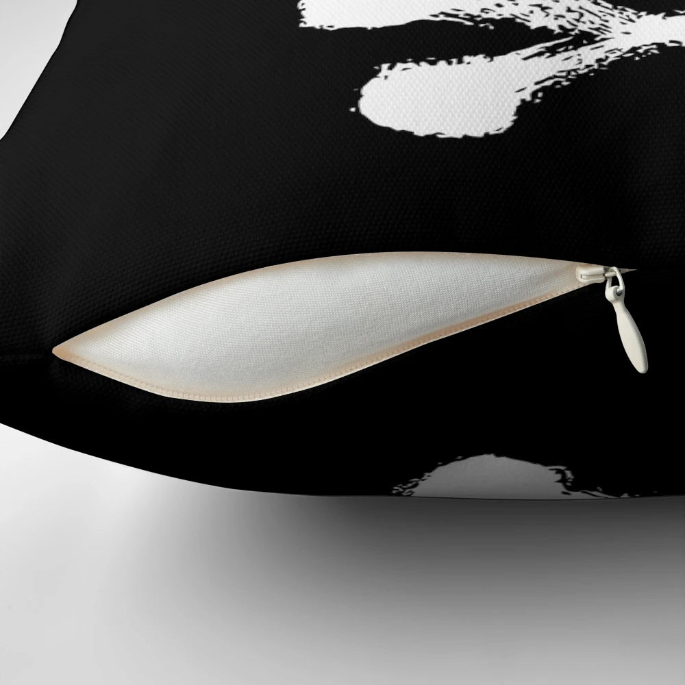 A vintage-inspired, distressed punk rock pillow featuring a bold, edgy design