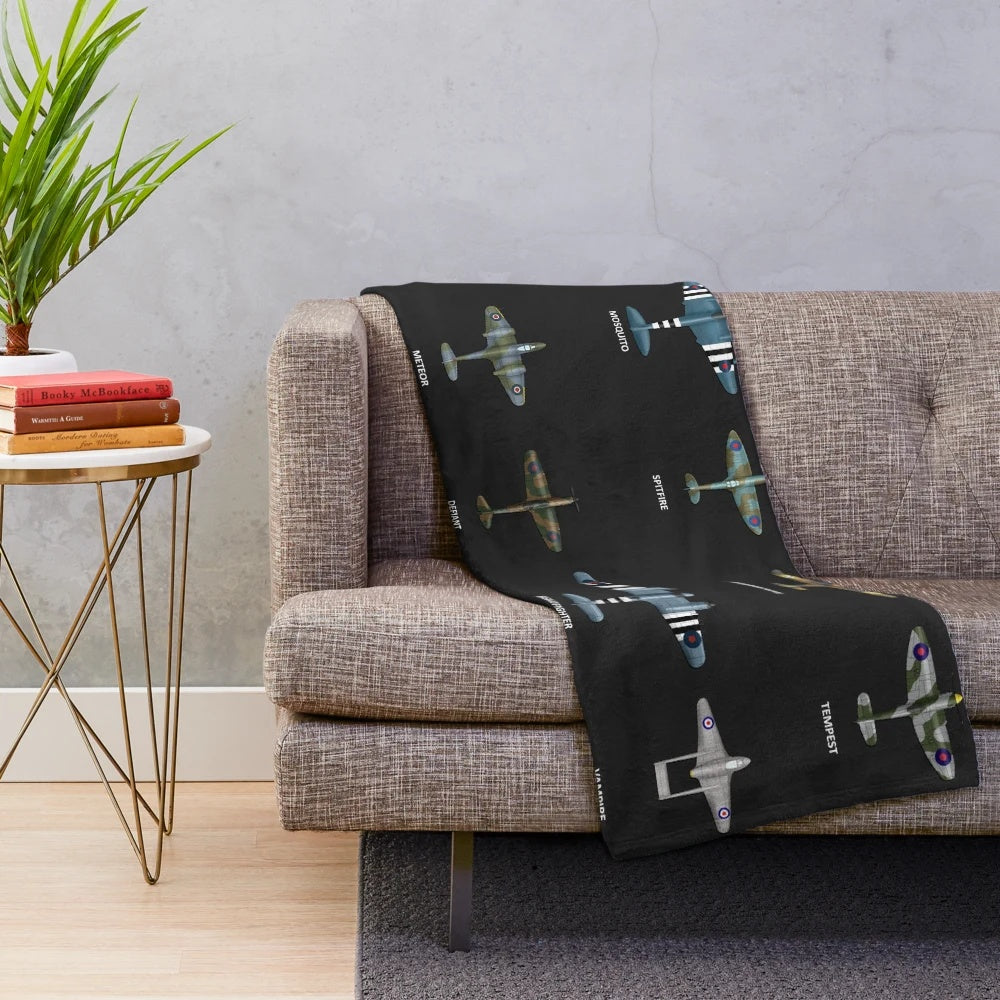 Plush blanket featuring vintage RAF fighter planes like the Spitfire, Hurricane, and more