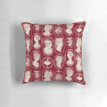 Vintage red cameo pillow with floral and Victorian-inspired design