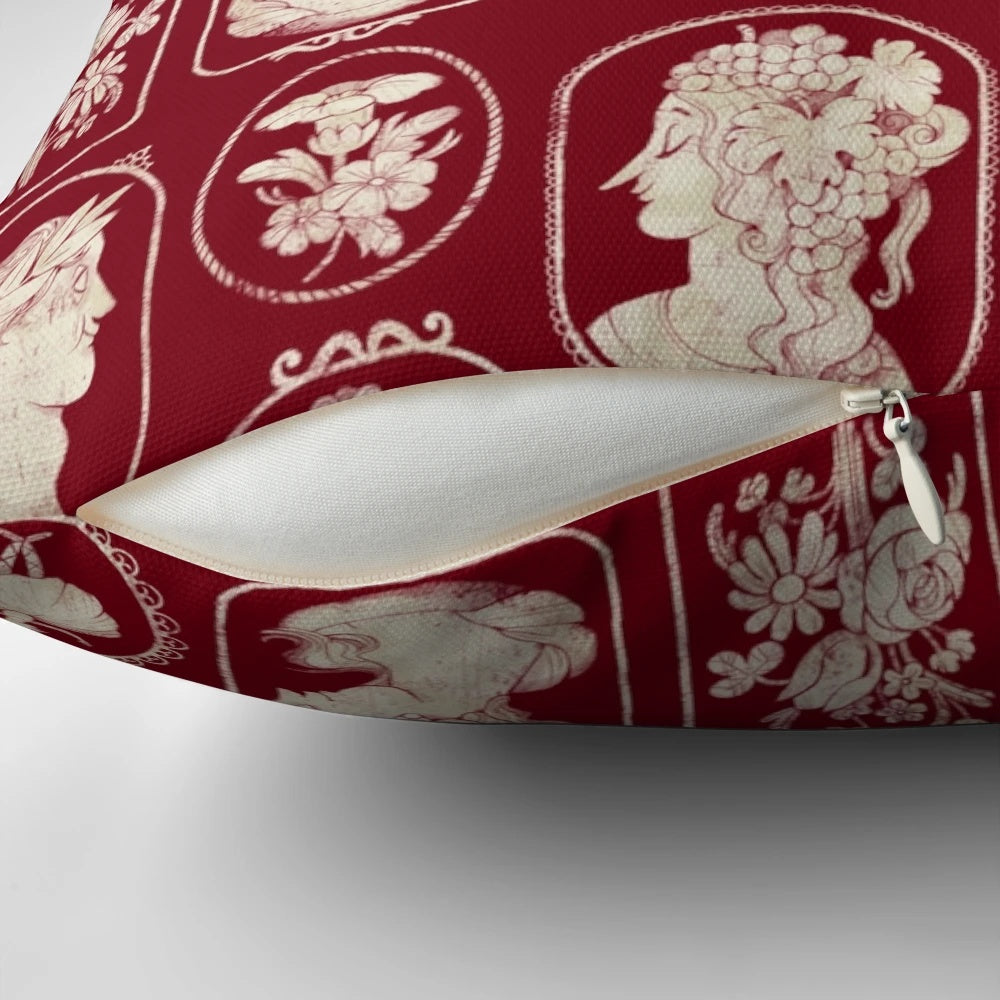 Vintage red cameo pillow with floral and Victorian-inspired design