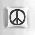 Vintage retro boho peace sign printed on a soft, decorative pillow