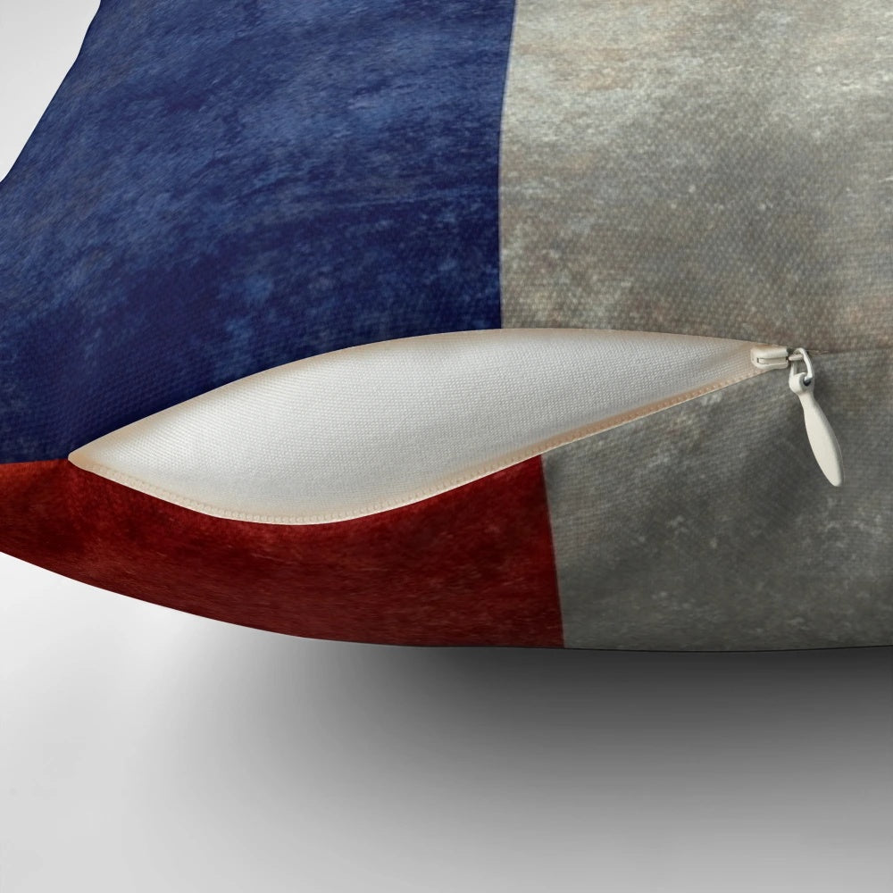 Vintage retro-style pillow featuring the flag of France in a distressed, aged look