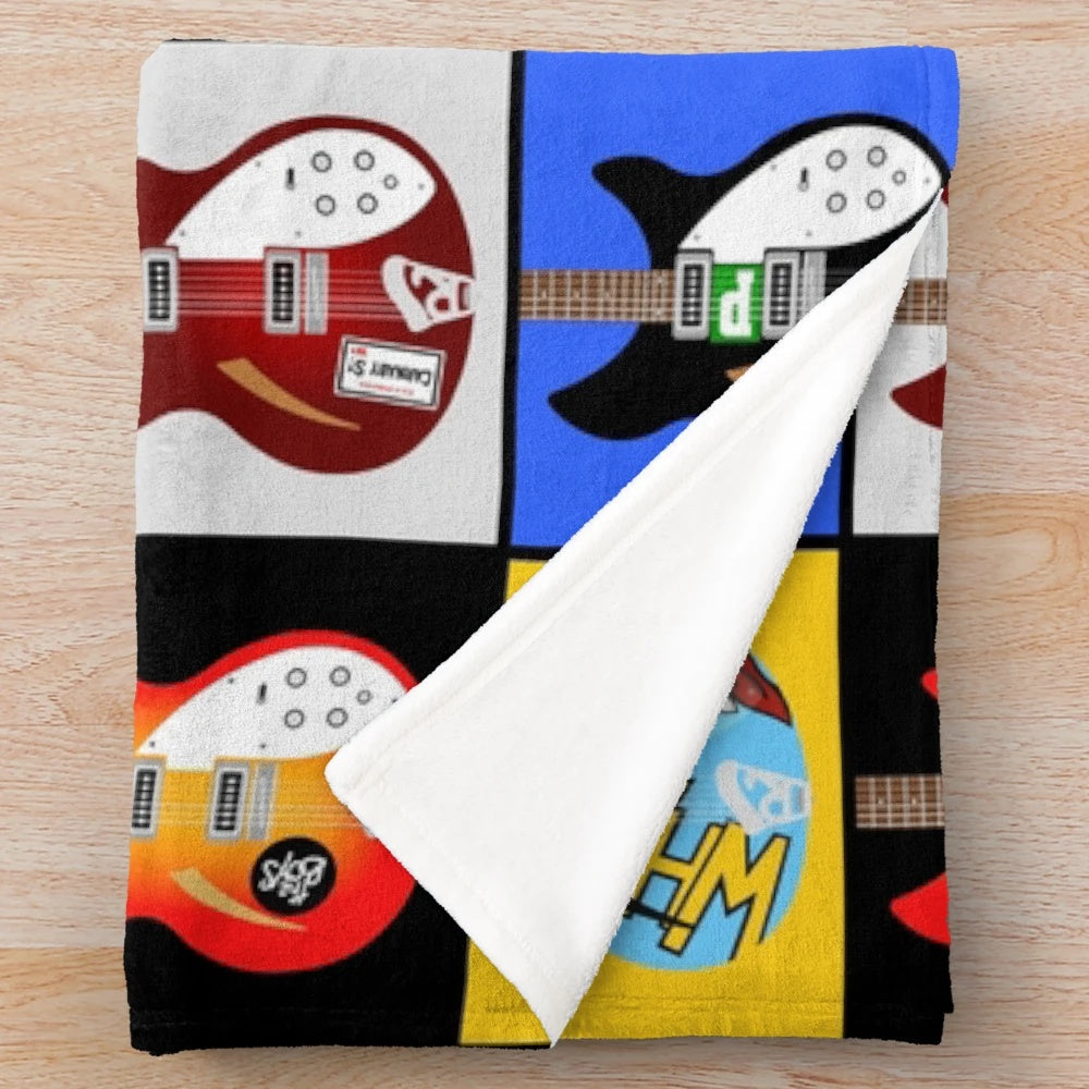 Plush blanket featuring vintage Rickenbacker guitar design, inspired by Paul Weller's guitar collection
