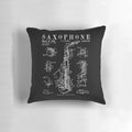 Vintage patent drawing of a saxophone printed on a throw pillow for jazz and music enthusiasts.