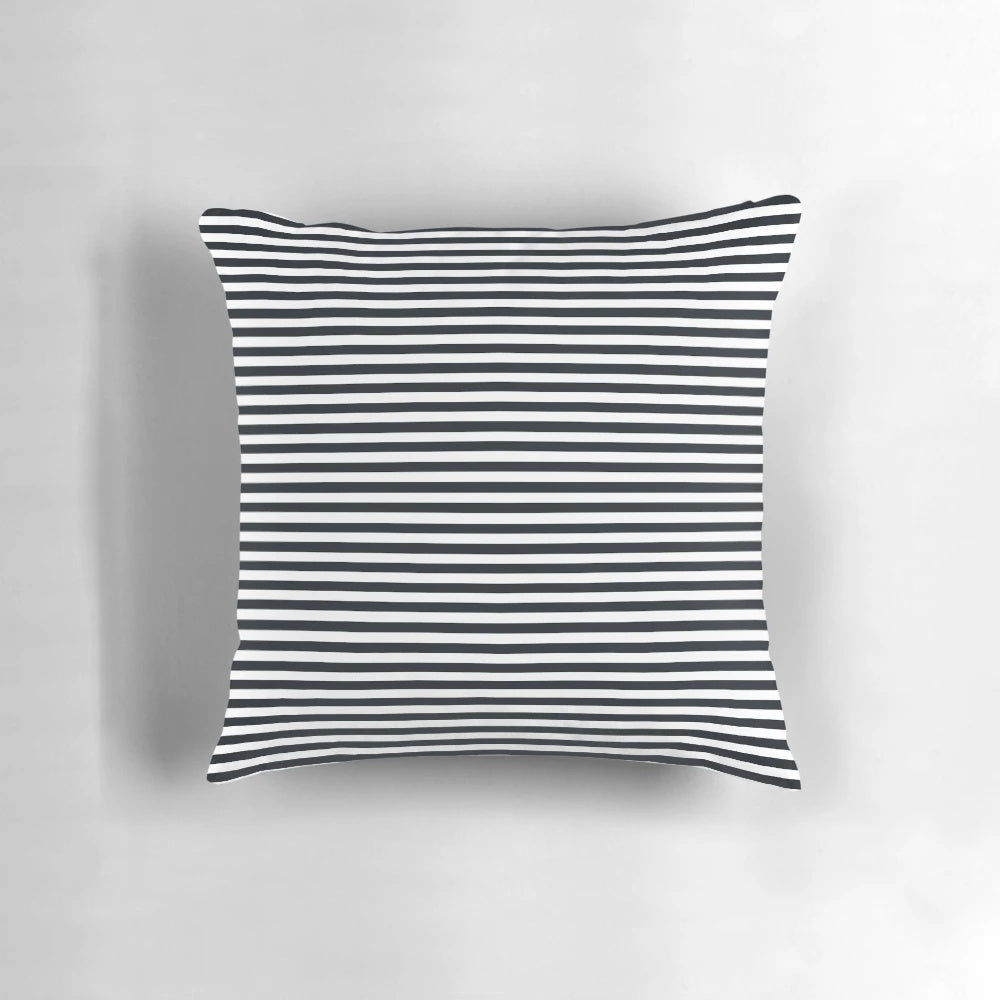 Vintage-inspired black and white striped pillow with a modern, elegant design.
